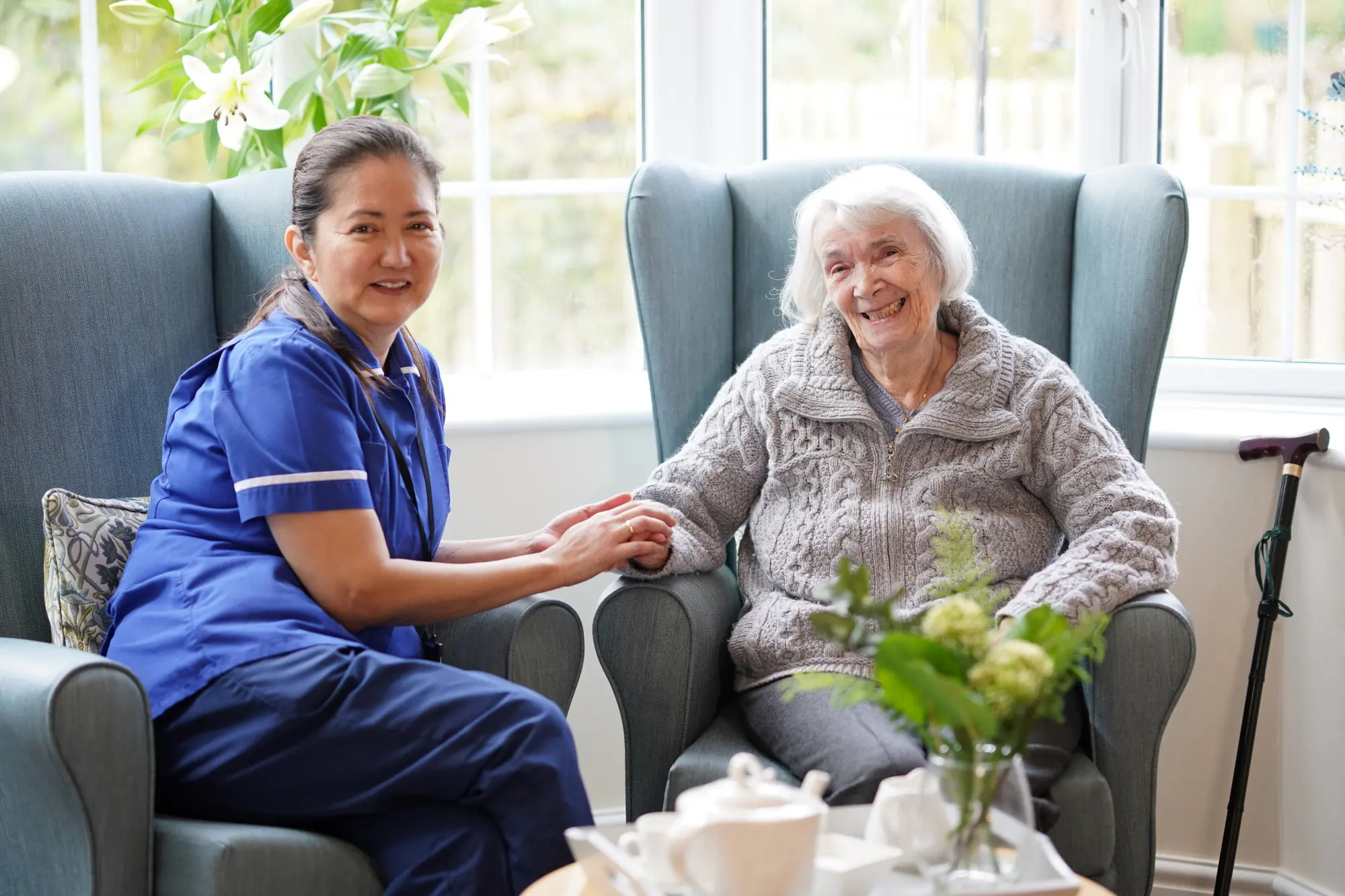 Carer with elderly resident